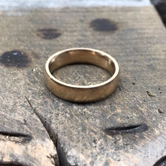 Polish-the-finished-gold-wedding-band.jpg